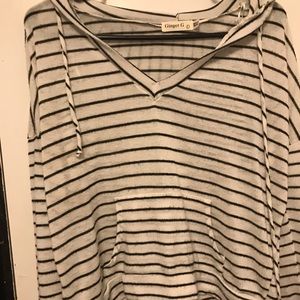 Stripped long sleeved shirt.